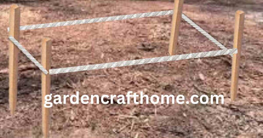 marking the planter on the ground with a wooden peg and a string 