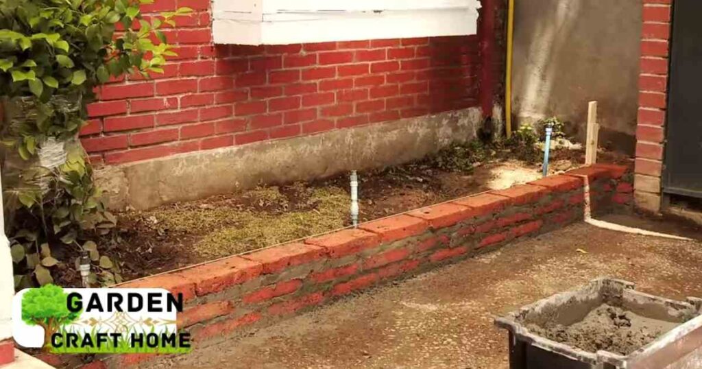 laying the final bricks of the Planter 